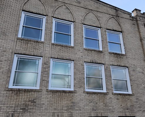 46703451100671276 New windows on older building.